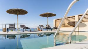 Bazén v ubytování Kiotari Akti Beachfront Villas nebo v jeho okolí