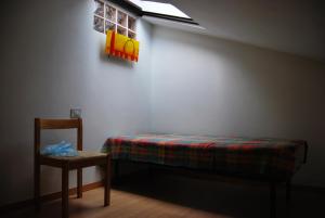 Ein Bett oder Betten in einem Zimmer der Unterkunft Casa Emma