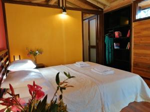 
Ein Bett oder Betten in einem Zimmer der Unterkunft Hotel Oiki BeachCamp

