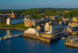 an aerial view of a city with a marina at Bristol Harbor Inn in Bristol +12 photos