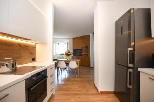 Kuchyň nebo kuchyňský kout v ubytování Residenza Alba - Molveno