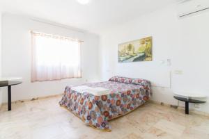 Postel nebo postele na pokoji v ubytování Apartamento Xixo