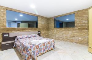 Postel nebo postele na pokoji v ubytování Apartamento Xixo