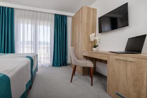 TV a/nebo společenská místnost v ubytování Hotel Porat