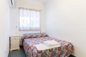 Postel nebo postele na pokoji v ubytování Apartamento Xixo