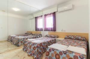 Postel nebo postele na pokoji v ubytování Apartamento Xixo