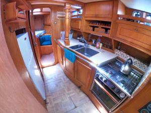 an overhead view of a kitchen with a sink and stove at ATAO Plongee in Les Anses-dʼArlets