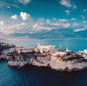 an island in the middle of the water at Il Borgo Apartment in Gaeta