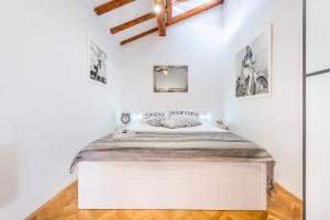 Posteľ alebo postele v izbe v ubytovaní Beach Lapad Apartment Villa Tolja