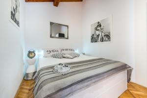 Posteľ alebo postele v izbe v ubytovaní Beach Lapad Apartment Villa Tolja
