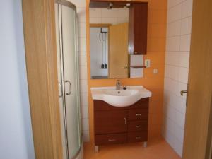 Ванная комната в Zobić Family Apartments