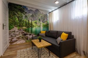 Posedenie v ubytovaní PIWNICZKA - Pokoje Zakopane Centrum
