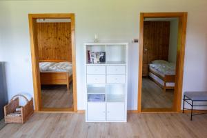 Postel nebo postele na pokoji v ubytování Chalet Orion