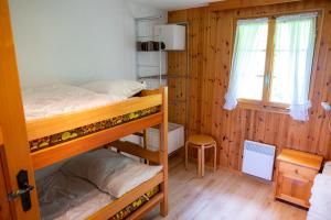 Postel nebo postele na pokoji v ubytování Chalet Orion