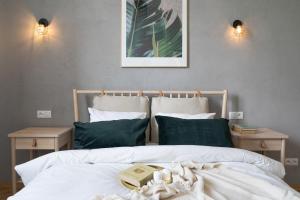 Posteľ alebo postele v izbe v ubytovaní Warsaw Concierge Filtrowa