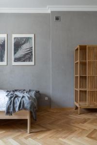Posteľ alebo postele v izbe v ubytovaní Warsaw Concierge Filtrowa