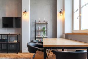 Televízia a/alebo spoločenská miestnosť v ubytovaní Warsaw Concierge Filtrowa