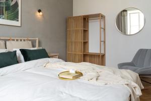 Posteľ alebo postele v izbe v ubytovaní Warsaw Concierge Filtrowa