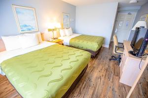 Giường trong phòng chung tại Ocean Paradise Hotel & Resort