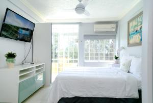 Katil atau katil-katil dalam bilik di Choose To Be Happy at Seymour # 9 and #16 - Studio Apartments