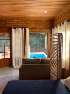 Cama ou camas em um quarto em Cactus Chalés & Cabanas em lumiar mais 37 fotos