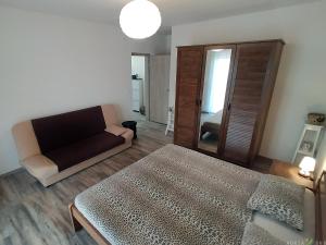 En eller flere senge i et værelse på Nice Apartment Near The Sea ES3