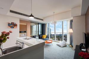 Postel nebo postele na pokoji v ubytování S6 Service Apartment（Chengdu Chunxi Road Taikoo Li Branch）