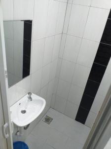Koupelna v ubytování Orange Villa Hotel Near Palm Mall Seremban + 5 fotografií