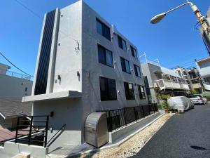 東京にあるHill Side Terrace Hiroo Shibuya 103の通り側郵便箱付き建物