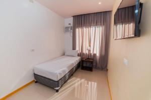 Voodi või voodid majutusasutuse Soi Suites toas