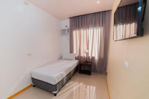 Voodi või voodid majutusasutuse Soi Suites toas