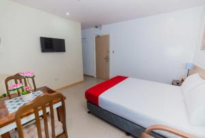 Voodi või voodid majutusasutuse Soi Suites toas