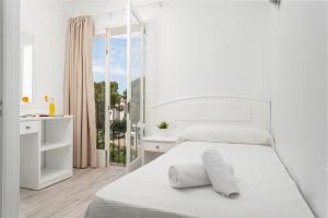 Postel nebo postele na pokoji v ubytování Hostal Talamanca