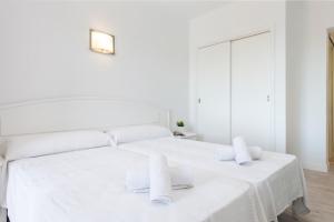 Postel nebo postele na pokoji v ubytování Hostal Talamanca