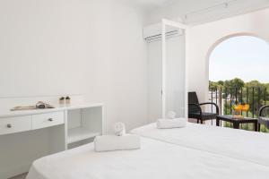 Postel nebo postele na pokoji v ubytování Hostal Talamanca