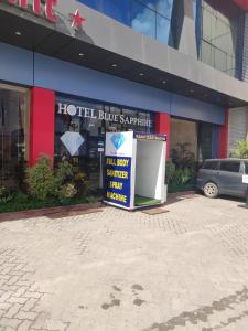 a sign in front of a hotel blue sapphire at Hotel Blue Sapphire in Dar es Salaam +37 photos