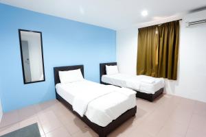 Postel nebo postele na pokoji v ubytování Lux Hotel