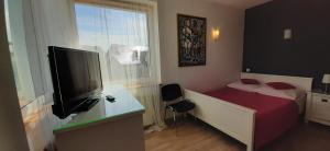 Łóżko lub łóżka w pokoju w obiekcie Słoneczny Dom pokoje i apartament na wynajem