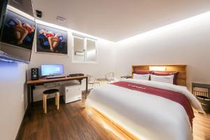 Katil atau katil-katil dalam bilik di Hotel Yeogijoa