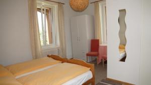 Postel nebo postele na pokoji v ubytování Hotel Beatus