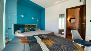 Ένα ή περισσότερα κρεβάτια σε δωμάτιο στο La Tortorella Room & Apartment