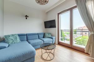 Posezení v ubytování Staywin Aura Gdańsk I
