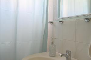 Kúpeľňa v ubytovaní Camelia Studios + 30 fotografií