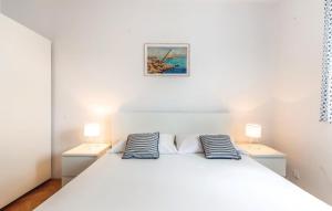 Posteľ alebo postele v izbe v ubytovaní Apartman Crikvenica