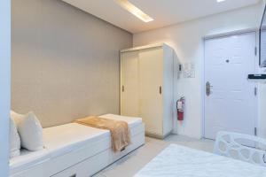 Postel nebo postele na pokoji v ubytování Baymont Suites & Residences