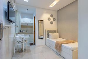 Postel nebo postele na pokoji v ubytování Baymont Suites & Residences