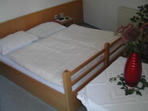 Voodi või voodid majutusasutuse Ferienwohnung 11 Planneralm toas