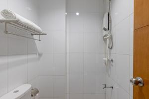 Koupelna v ubytování Baymont Suites & Residences