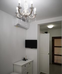 TV a/nebo společenská místnost v ubytování Brize Guest House
