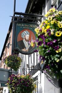 The logo or sign for the inn 